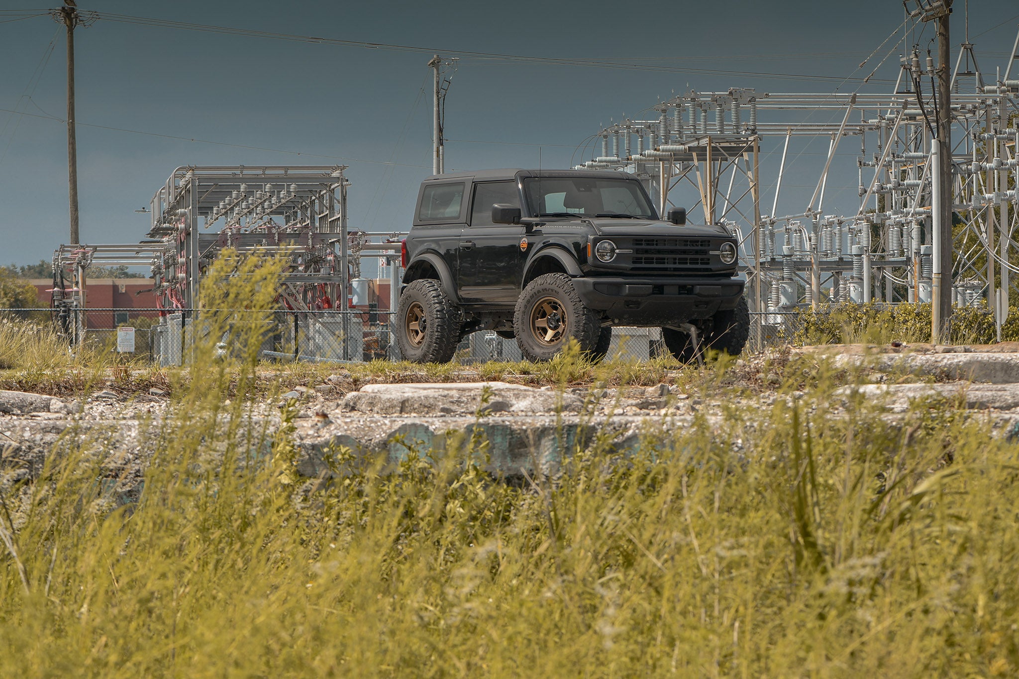Ford Bronco 2 door on Satin Bronze Overland Sector ATLAS 17x9