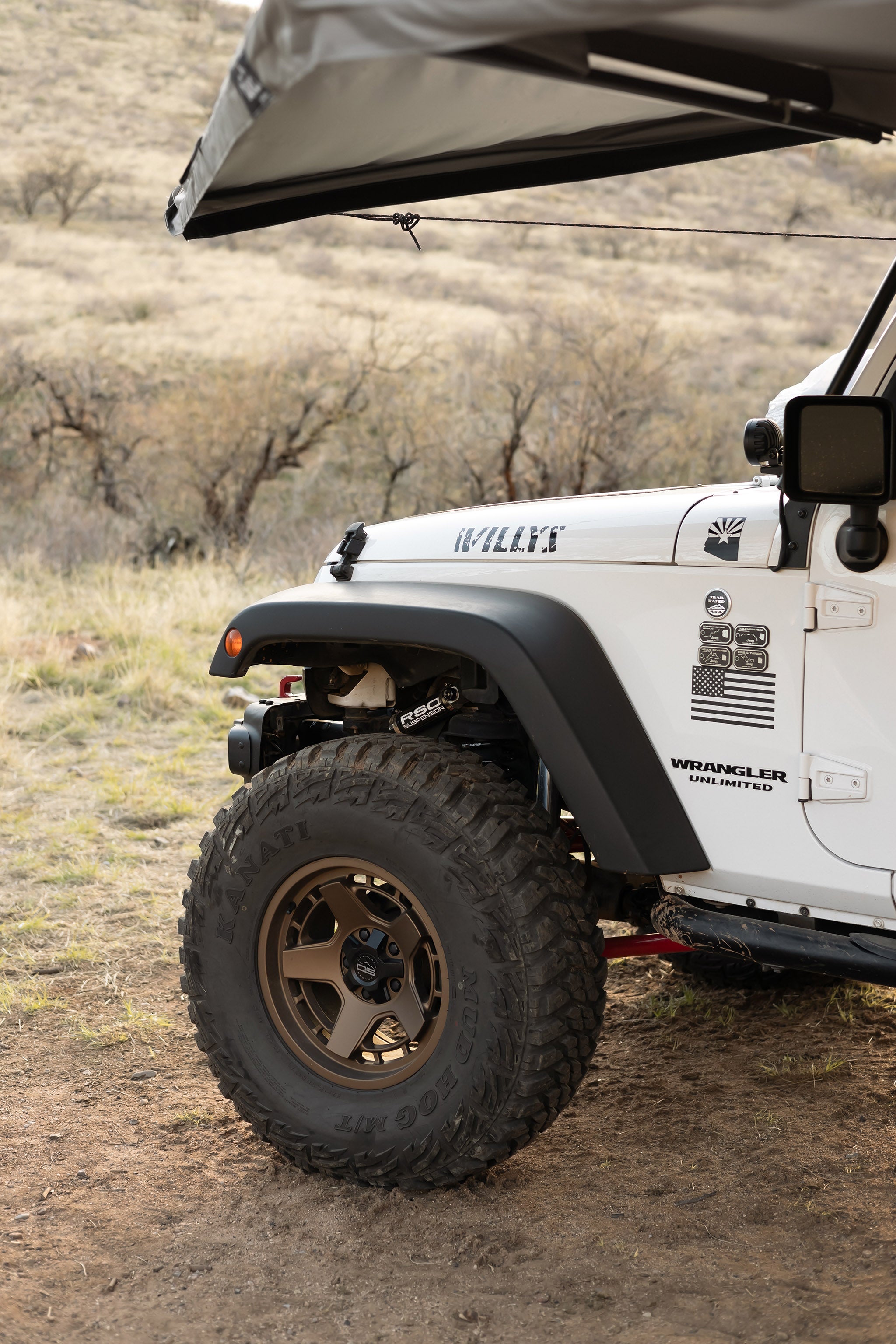 Jeep Wrangler 4 door on Satin Bronze Overland Sector ATLAS 17x9