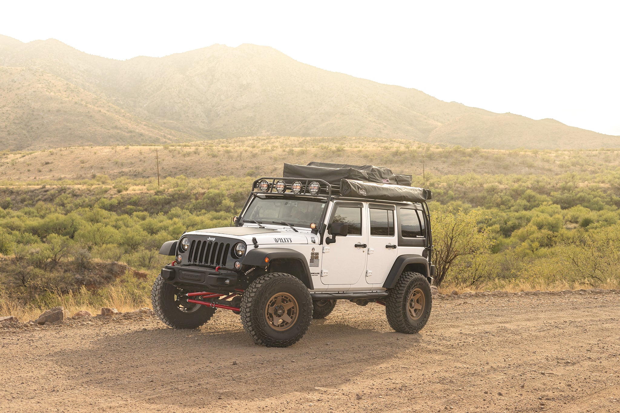 Jeep Wrangler 4 door on Satin Bronze Overland Sector ATLAS 17x9