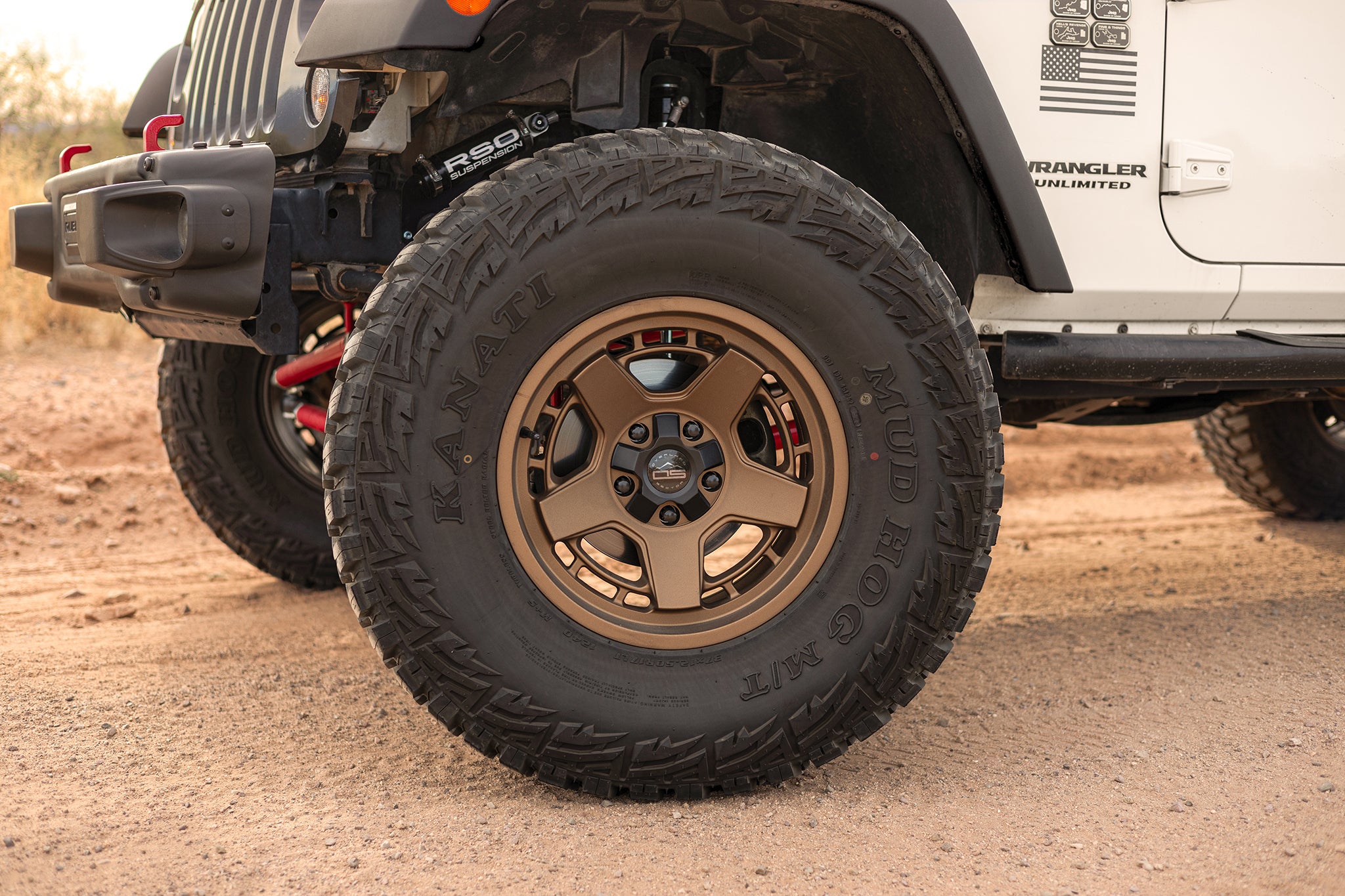 Jeep Wrangler 4 door on Satin Bronze Overland Sector ATLAS 17x9