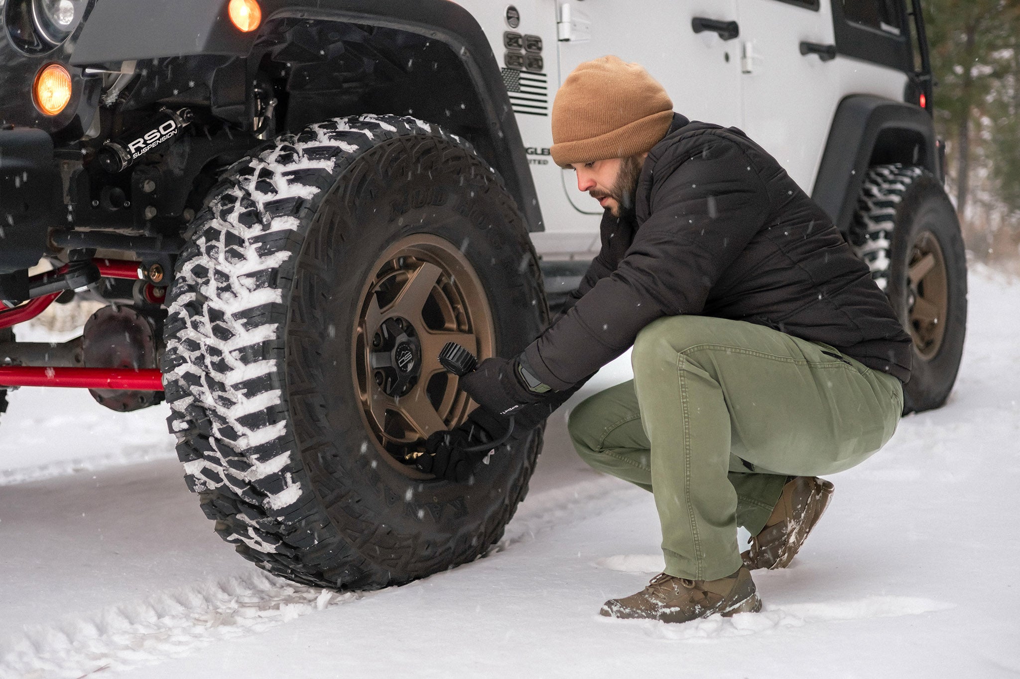 Jeep Wrangler 4 door on Satin Bronze Overland Sector ATLAS 17x9
