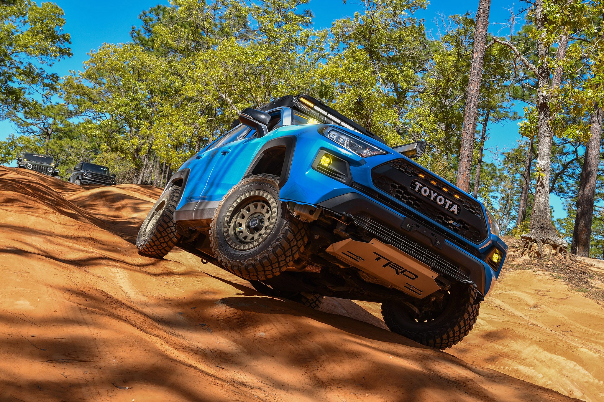 overland sector wheels rig gallery kj's toyota rav4 off-road trail on 17x9 satin bronze venture wheels 3 inch lift 32 inch tires custom bumper roof rack roof cases on clay trail