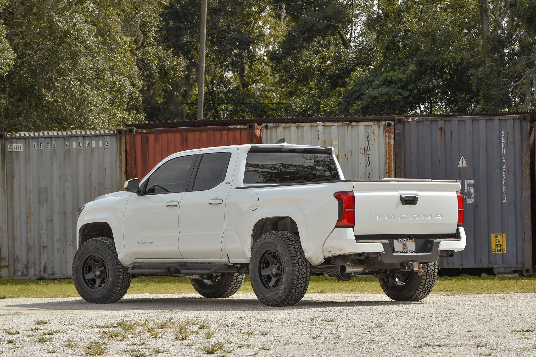 Toyota Tacoma on overland sector atlas black offroad overland wheel 17 inch