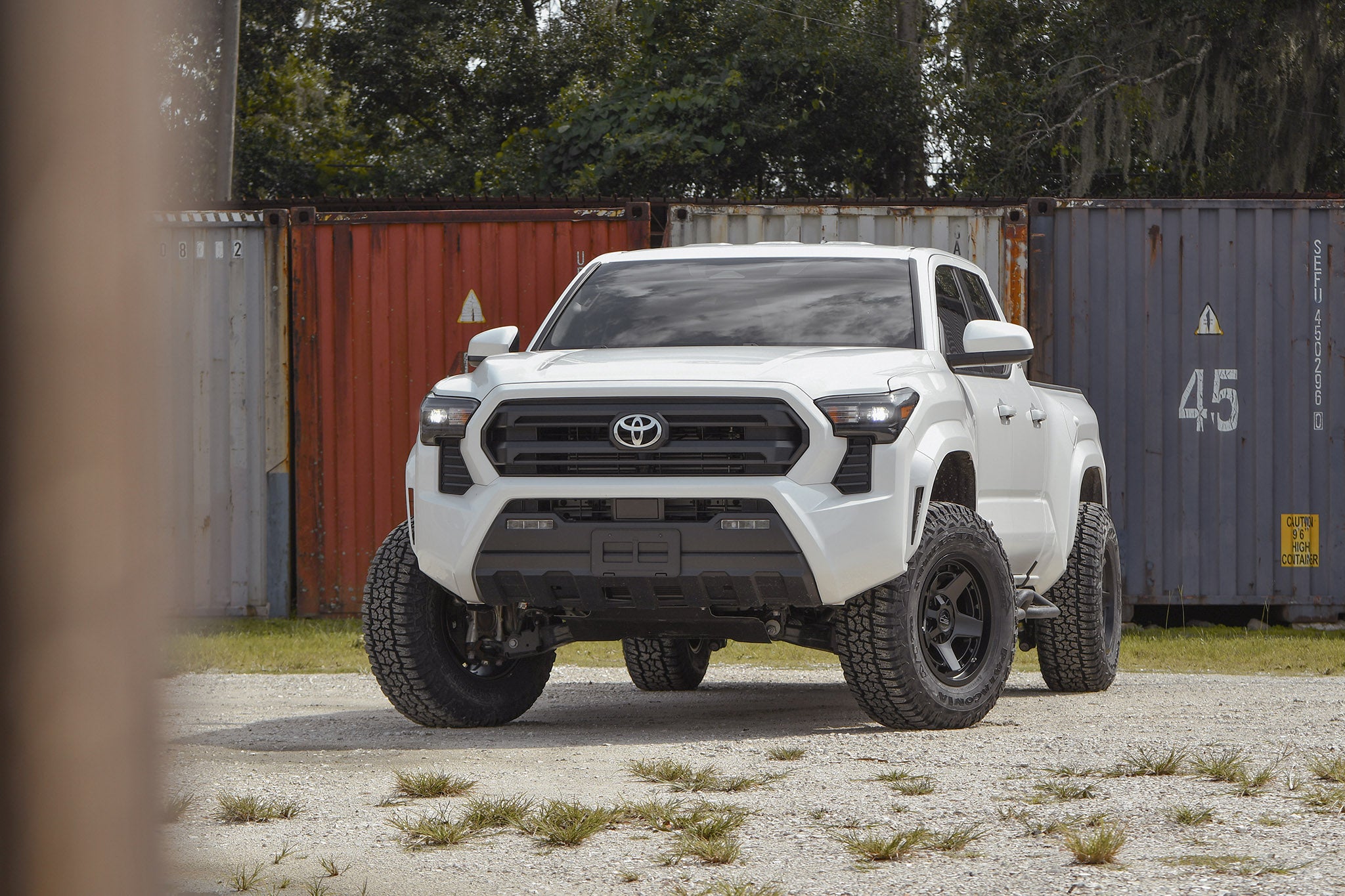 Toyota Tacoma on overland sector atlas black offroad overland wheel 17 inch