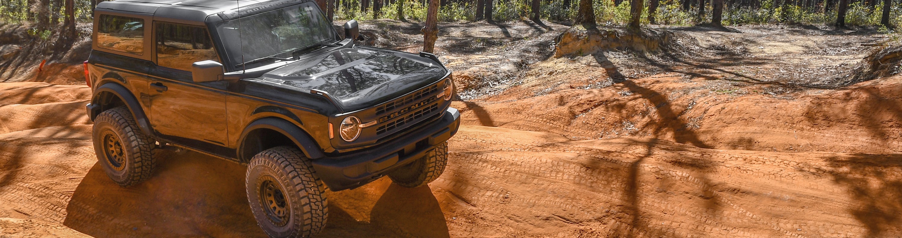 overland sector wheels bronkowski ford bronco off-roading overlanding in dirt on bronze venture wheels