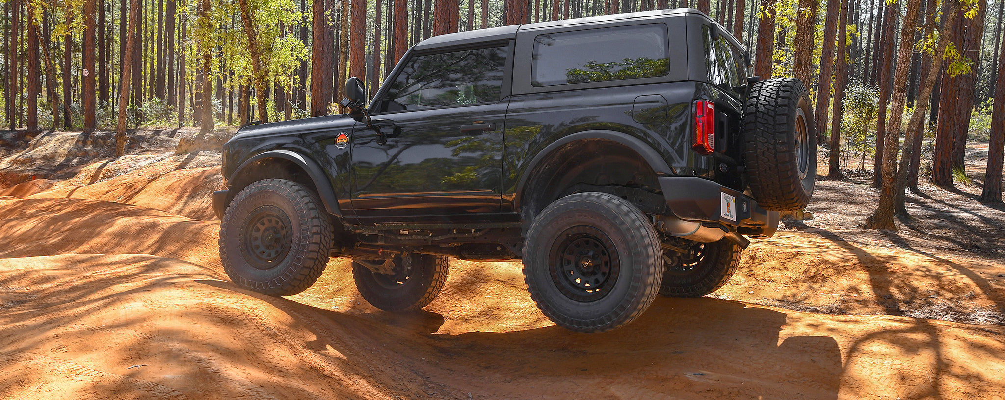 overland sector wheels bronkowski ambassador profile ford bronco in dirt on black venture wheels
