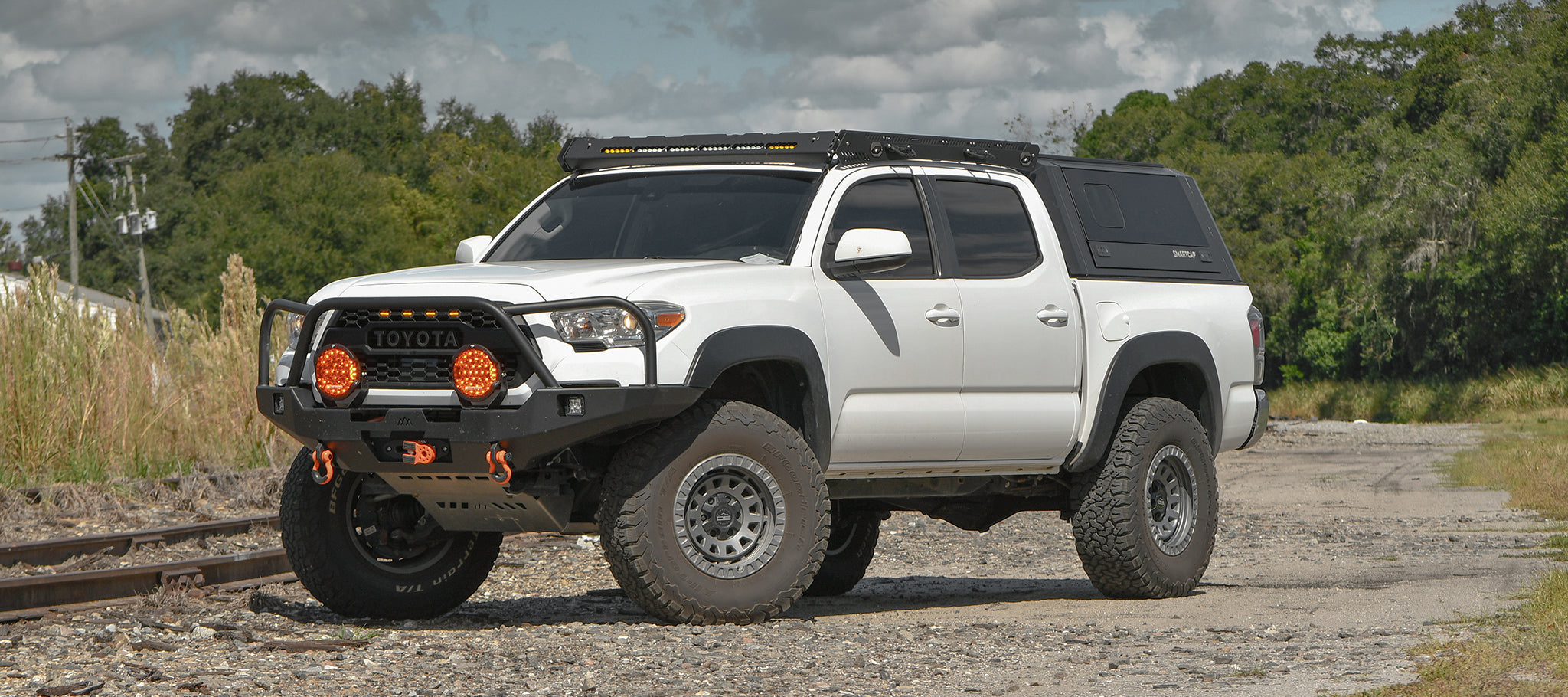 overland sector toyota tacoma on gray venture top pic